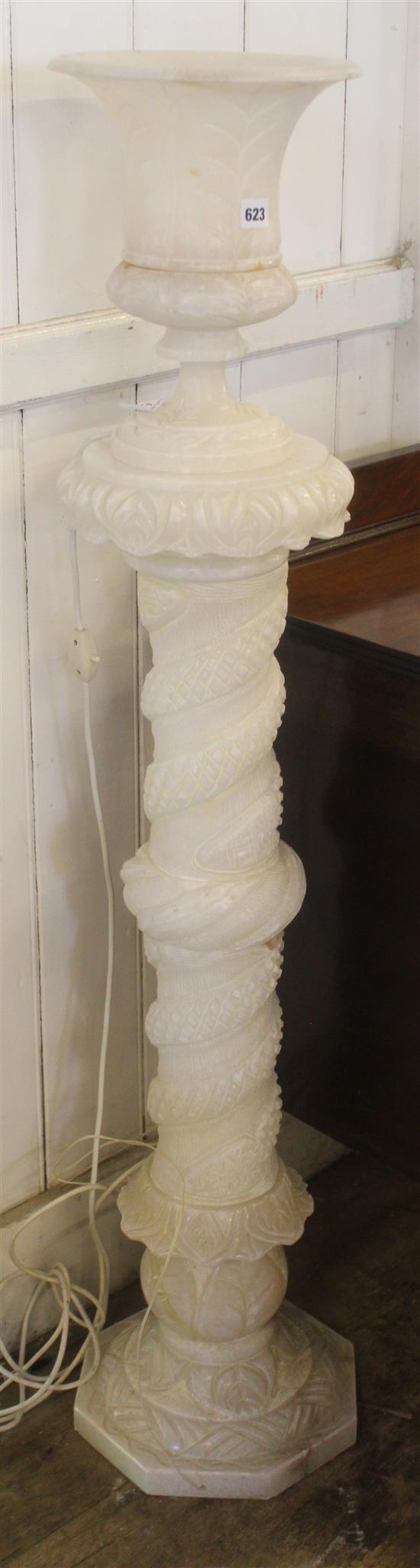 Alabaster pedestal with vase over